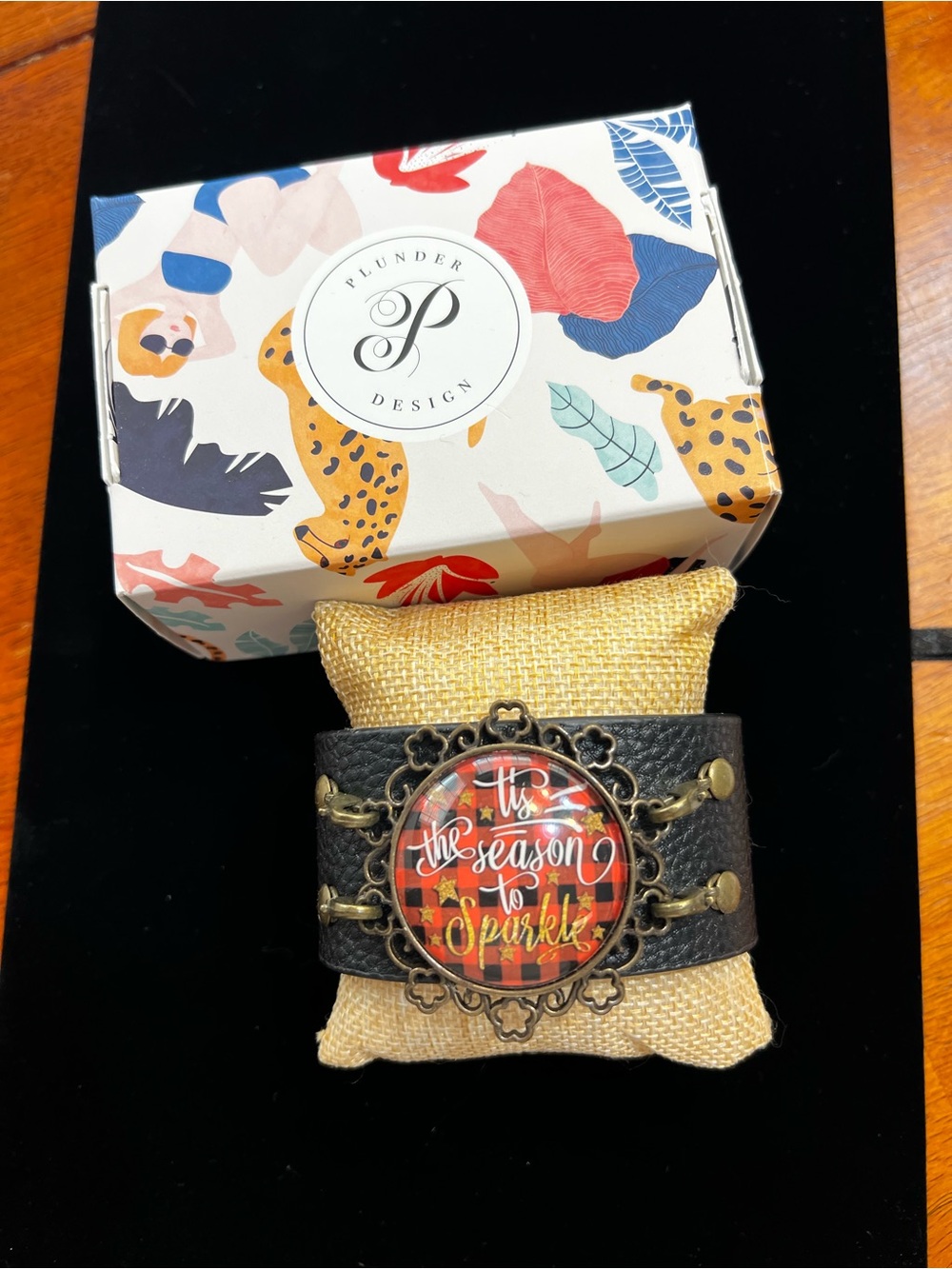Plunder Black Leather Cuff Bracelet with Red Plaid Holiday Medallion